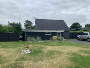 Summer House With A Hot Tub Near The Sea in Otterup